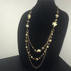 NWT. Long multi-chained beaded necklace.